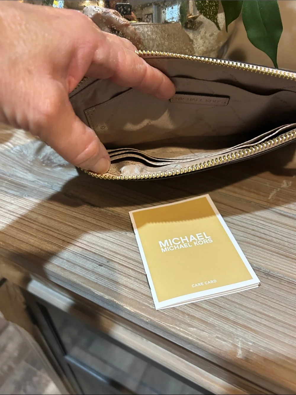Michael Kors Metallic Rose Gold Signature Wristlet